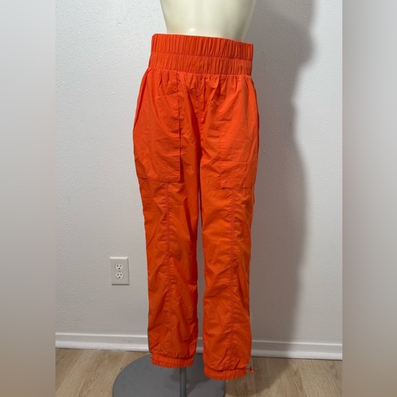 NWT Fabletics High-Waisted Piped Nylon Pant in Passion Orange - Picture 3 of 12